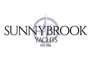 Blue text reads Sunny brook Yachts EST 1982, overlays a blue compass